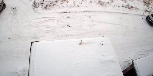 Webcam Ust-Kut - The courtyard of an building on Lenrabochikh street